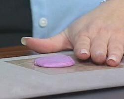 A pancake-shaped compound is on the table.
